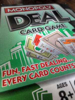 Img of Monopoly Deal Cover Art Close Up of Cards from the Deck